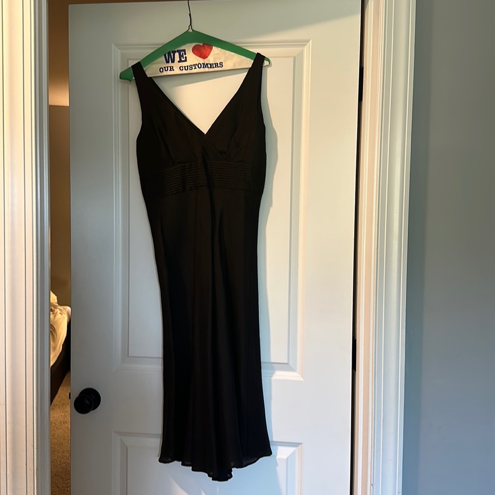 Black linen J. Crew dress. It is a size 6.